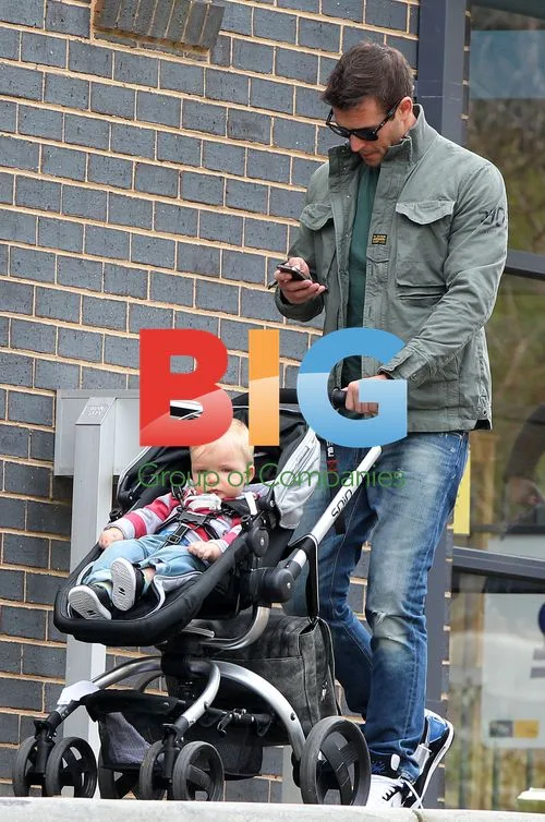 Kris Smith with son Ethan in Sydney