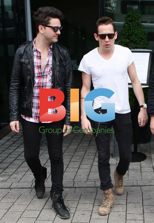 Mona Band Leaving Hotel in Birmingham