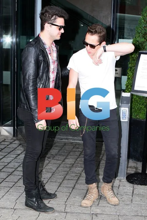 Mona Band Members Leaving Hotel in Birmingham