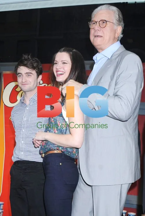 Daniel Radcliffe, Rose Hemingway and John Larroquette