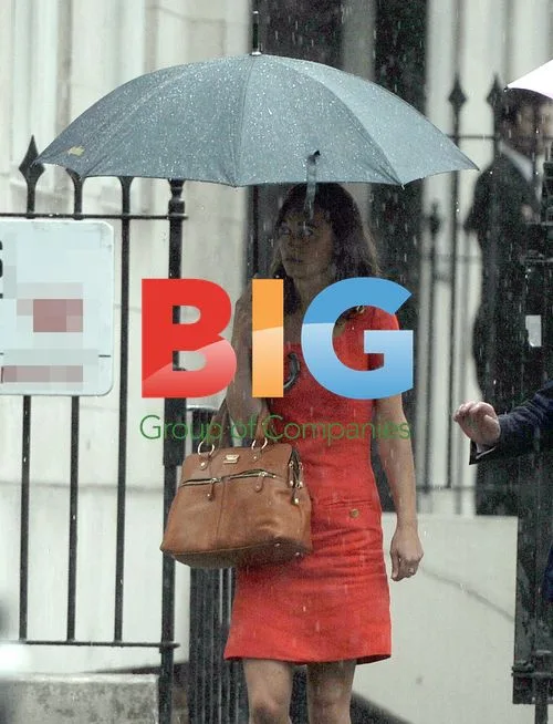 Pippa Middleton Out in London Rain