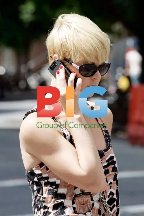 Singer Robyn on phone in NYC