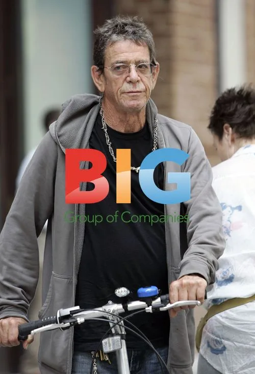 Lou Reed rides bicycle in NYC