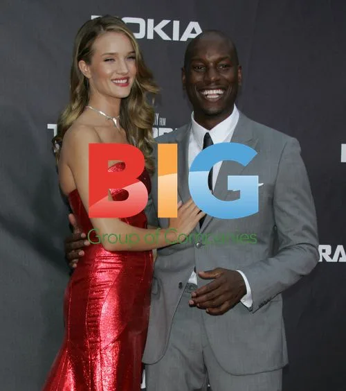 Rosie Huntington-Whiteley & Tyrese Gibson arrive for "Transformers" premiere