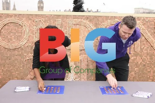 Alexandra Burke and Steve Backley coin stacking