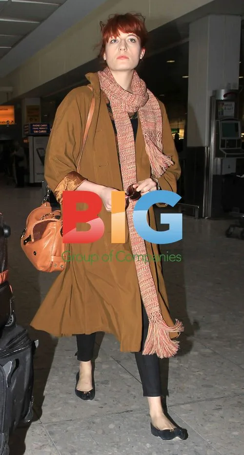 Florence Welch Arriving at London's Heathrow Airport