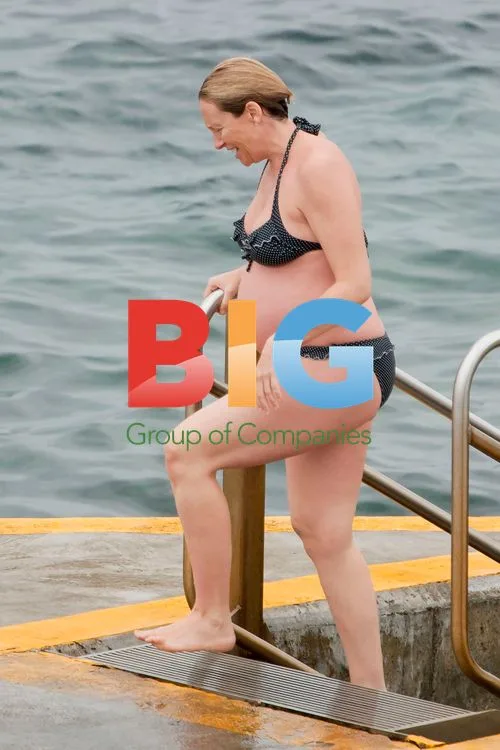 Pregnant Toni Collette Shows Baby Bump