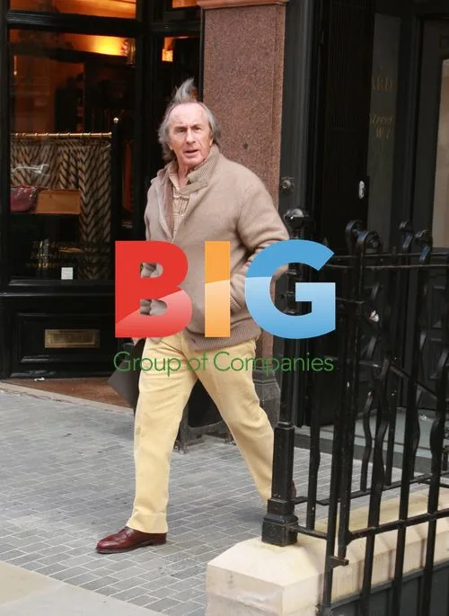 Jackie Stewart Leaving Hayward Clothes Shop