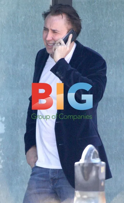Nicolas Cage Looks Upset On Phone