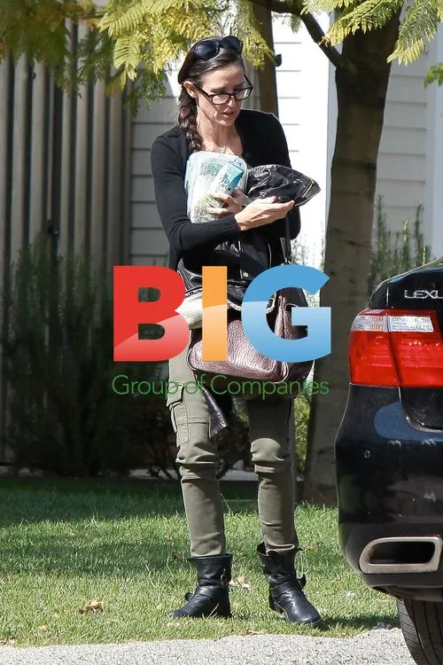 Demi Moore Arrives at Friend's House