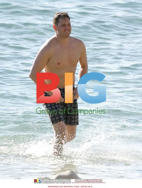 Michael Buble and Luisana Lopilato on Beach in Perth