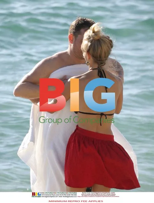 Michael Buble and Fiancee on Beach in Perth