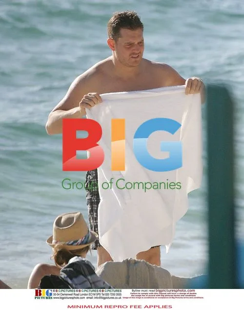 Michael Buble and Luisana Lopilato at the Beach