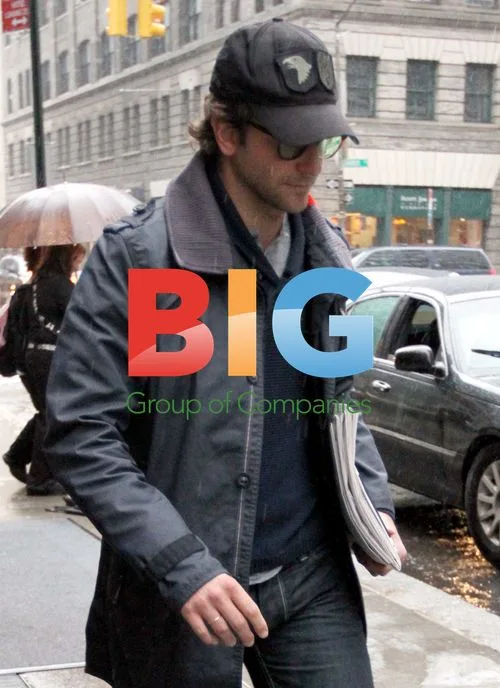 Bradley Cooper braves the rain in NYC
