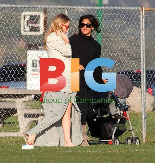 Kate Hudson with family at baseball game