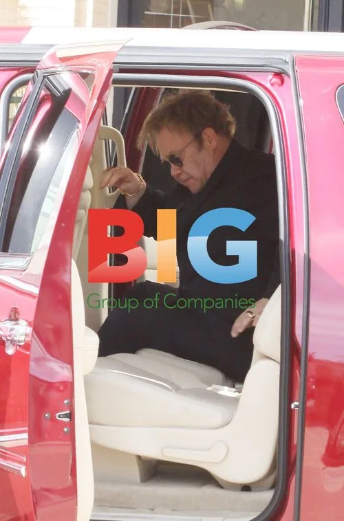 Elton John and David Furnish shopping at Barneys