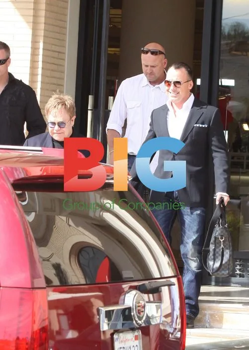 Elton John and David Furnish Shopping at Barneys
