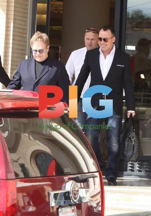 Elton John and David Furnish Shop at Barneys, Beverly Hills