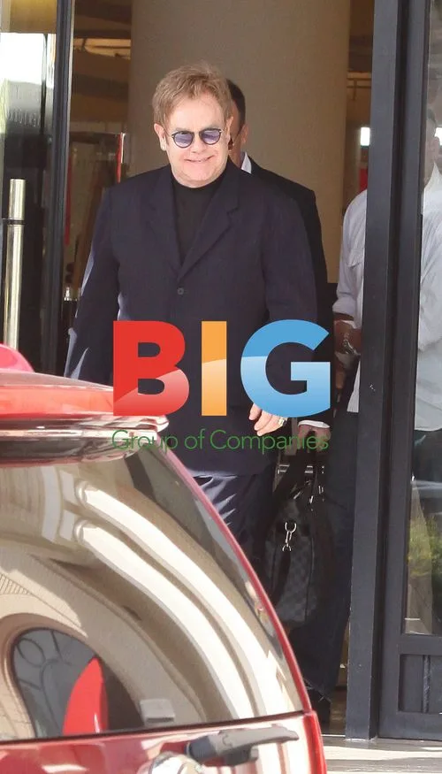 Elton John and David Furnish Shopping