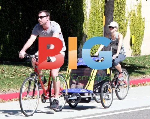 Naomi Watts and Liev Schreiber bike with sons