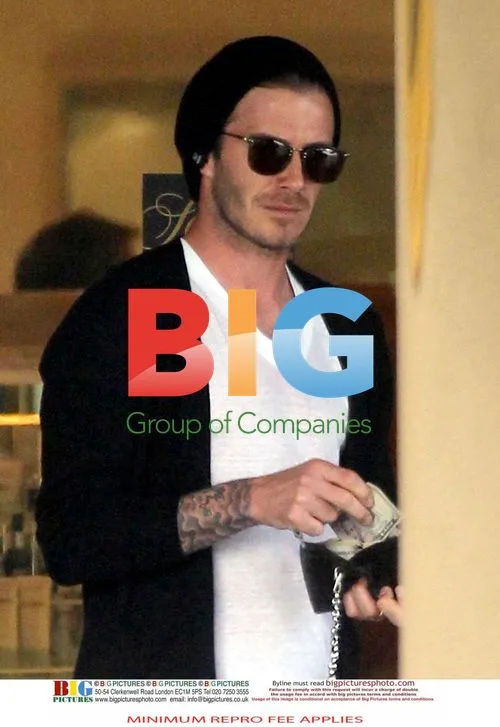 David Beckham and Brooklyn Shopping at Saks
