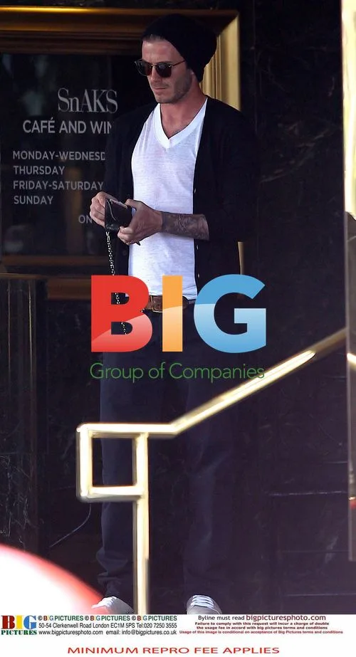 David Beckham and Brooklyn Shopping at Saks
