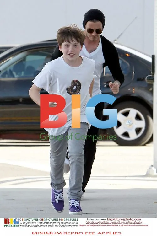 David Beckham and Brooklyn Shop at Saks