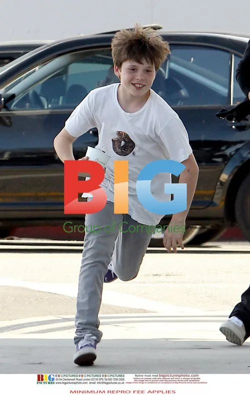 David Beckham and Brooklyn Shopping at Saks