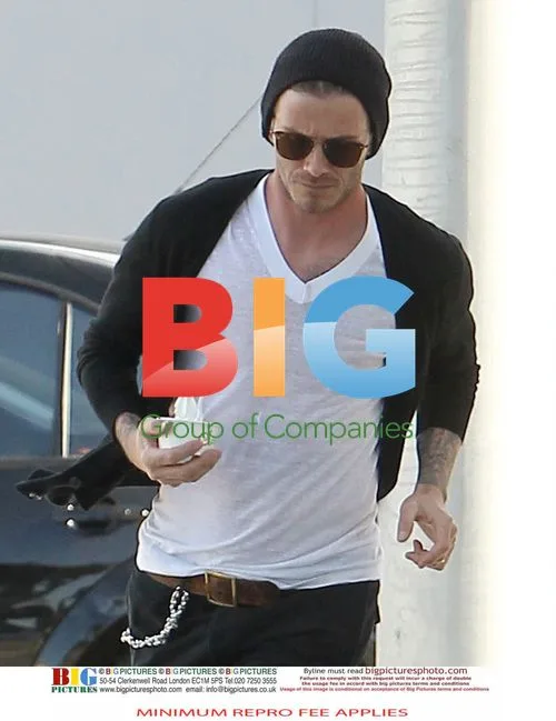 David Beckham and son Brooklyn shopping at Saks
