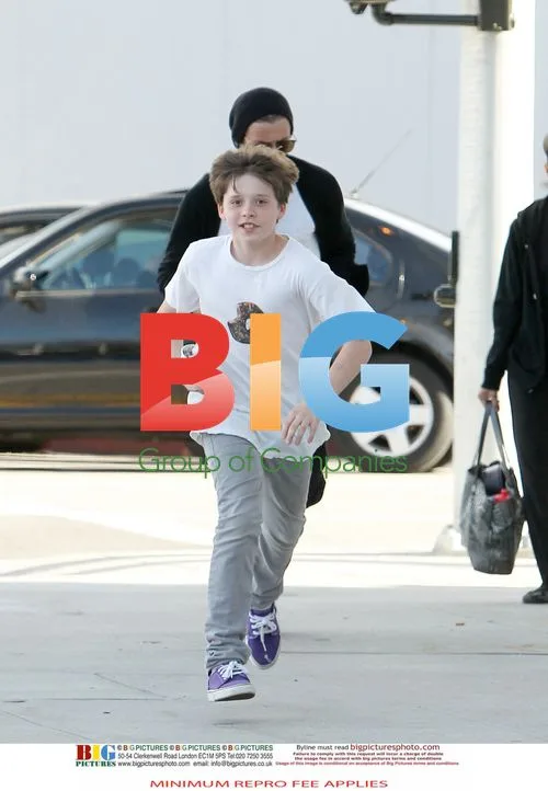David Beckham and Brooklyn Shop at Saks