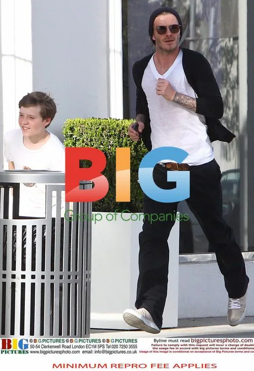 David Beckham and Son Brooklyn Shop at Saks
