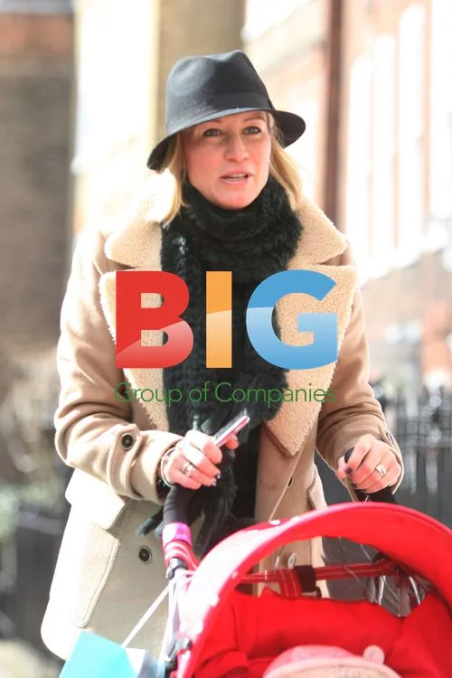 Denise Van Outen takes daughter Betsy for a stroll