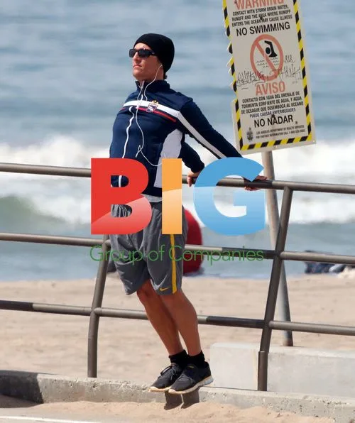 Matthew McConaughey Stretching on Malibu Beach