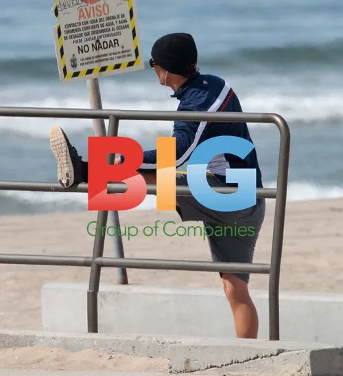Matthew McConaughey stretching on Malibu beach