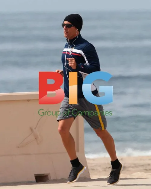 Matthew McConaughey stretching on Malibu beach