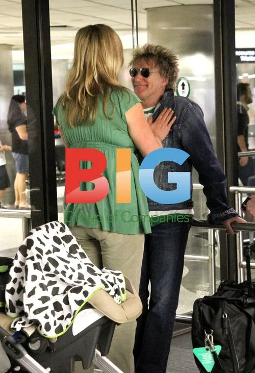 Rod Stewart Arrives at Miami Airport with Family