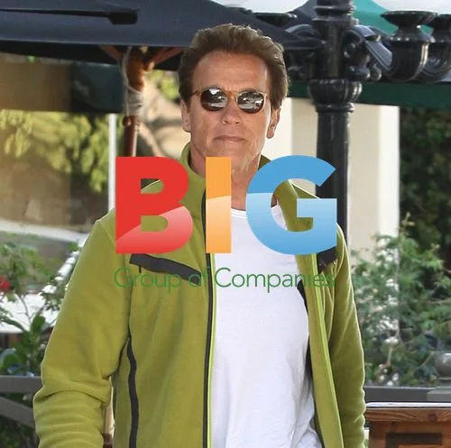 Arnold Schwarzenegger having lunch