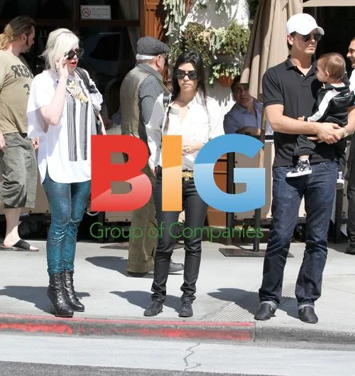 Kourtney Kardashian with son and husband