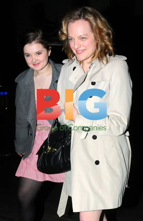 Elizabeth Moss Leaving Club in London