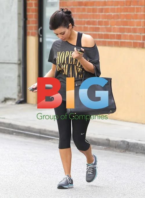 Kim Kardashian and Molly Sims Chat Outside Gym