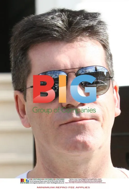 Simon Cowell out in London
