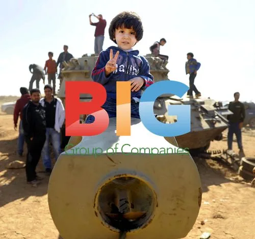People of Benghazi climb on burnt-out tanks