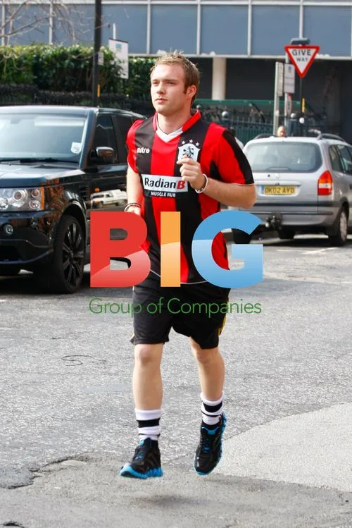 Chris Fountain Runs on Coronation Street Set