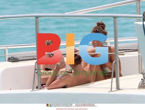 Coleen Rooney Relaxes with Friends in Caribbean