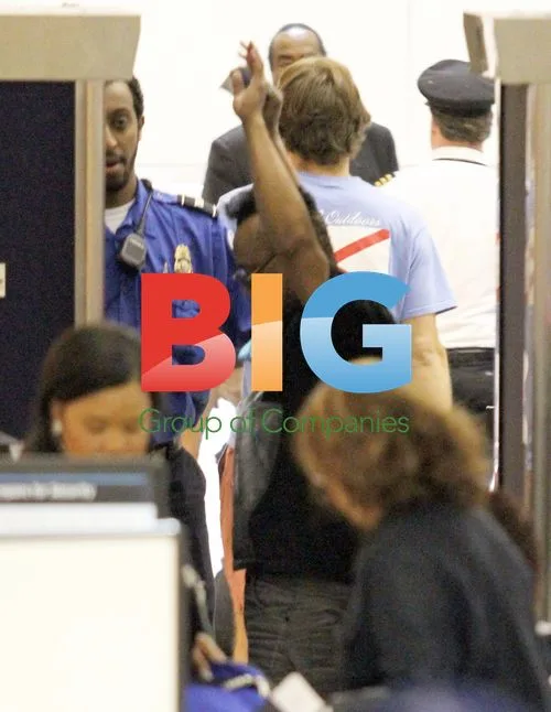 Apl.de.ap of Black Eyed Peas arrives at LAX