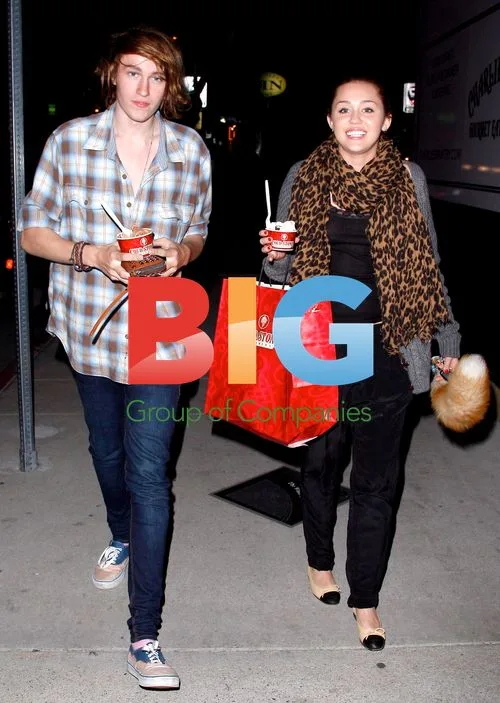 Miley Cyrus out with brother Braison