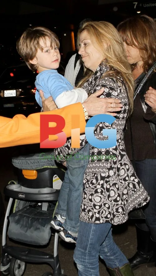 Sheryl Crow and son Levi at LAX