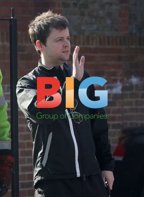 Declan Donnelly supervises removal of lines outside home