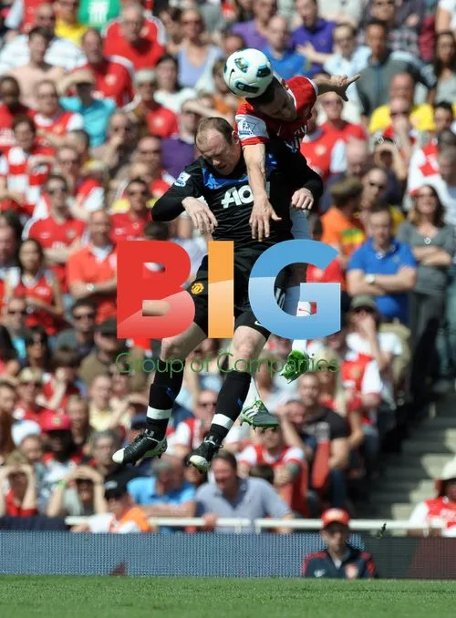 Wayne Rooney and Laurent Koscielny at Arsenal vs Manchester United