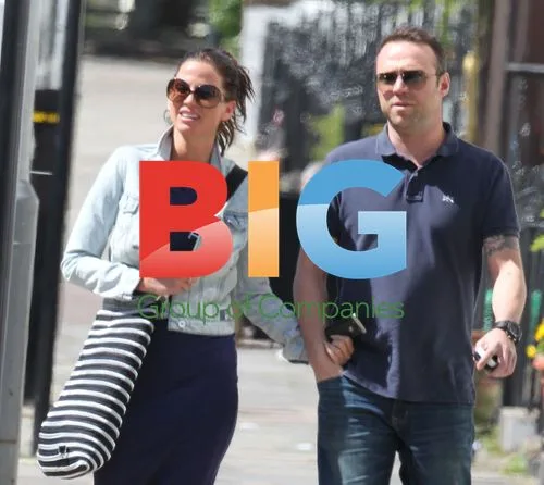 Sarah Harding and Tom Crane in London